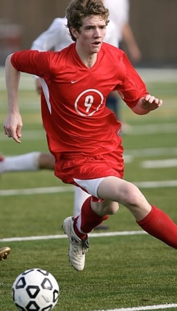 Young man playing football